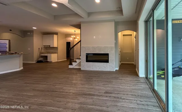 a view of a livingroom with wooden floor