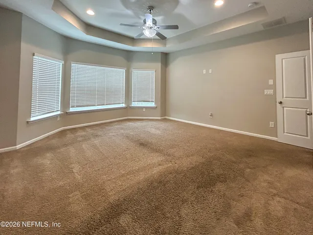a bathroom with a sink vanity and a mirror