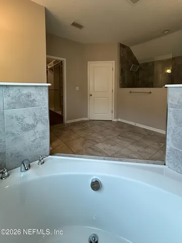 a bathroom with a tub