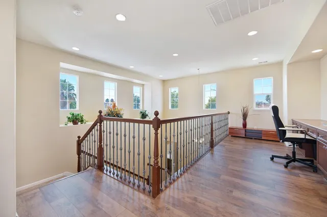 a view of a hallway with workspace