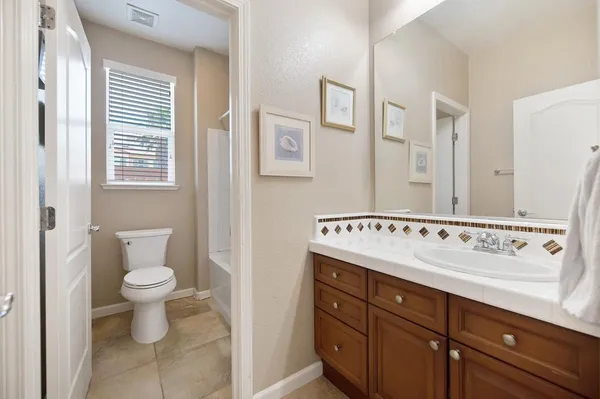 a bathroom with a sink and a toilet
