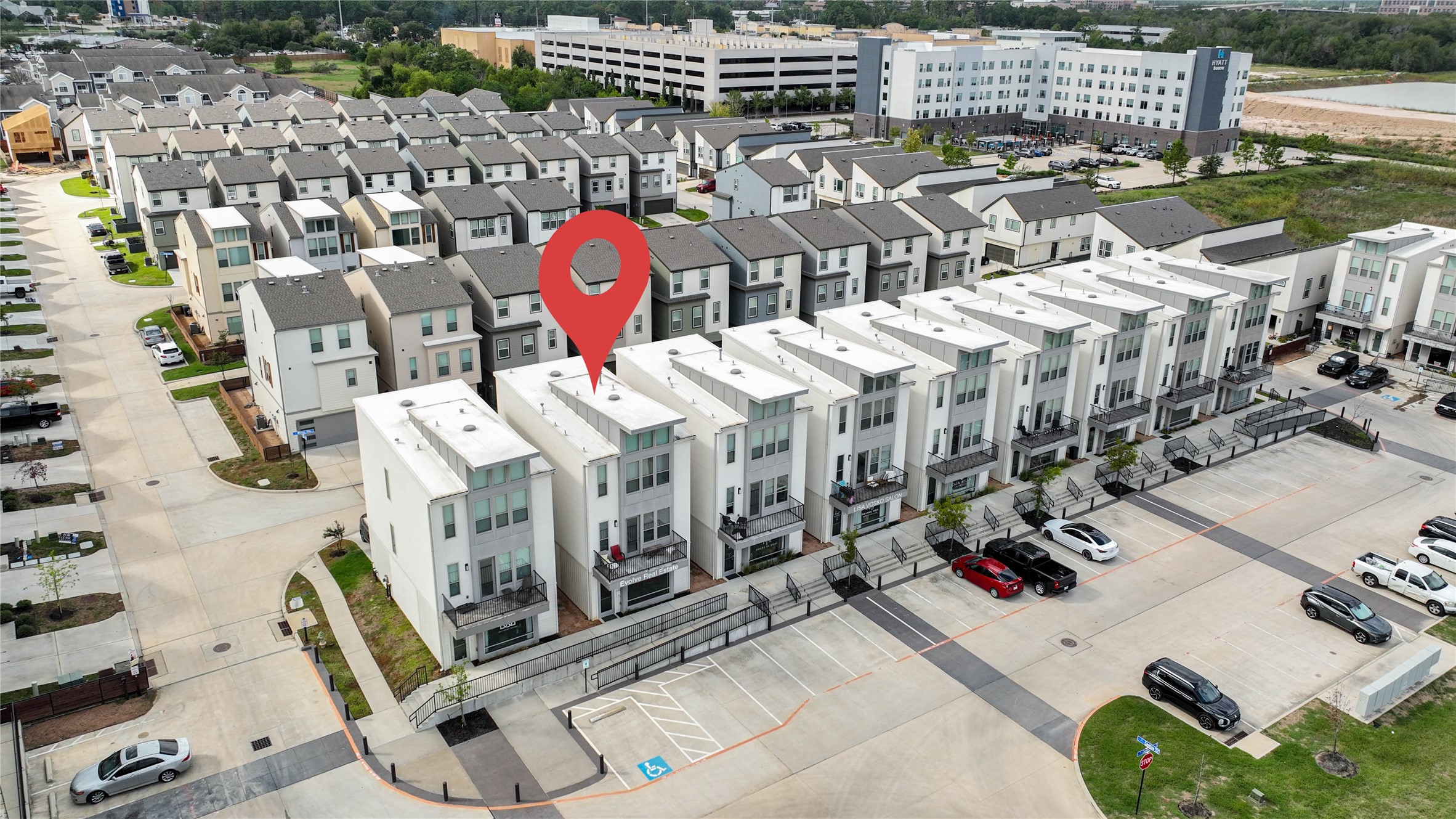 18732 Centro Main Street, Unit B Shenandoah, TX 77385 - Photo 37 of 42 Modern townhouse in a well-maintained community, featuring contemporary architecture, ample parking, and convenient access to nearby amenities. Ideal for those seeking a stylish and comfortable living space.