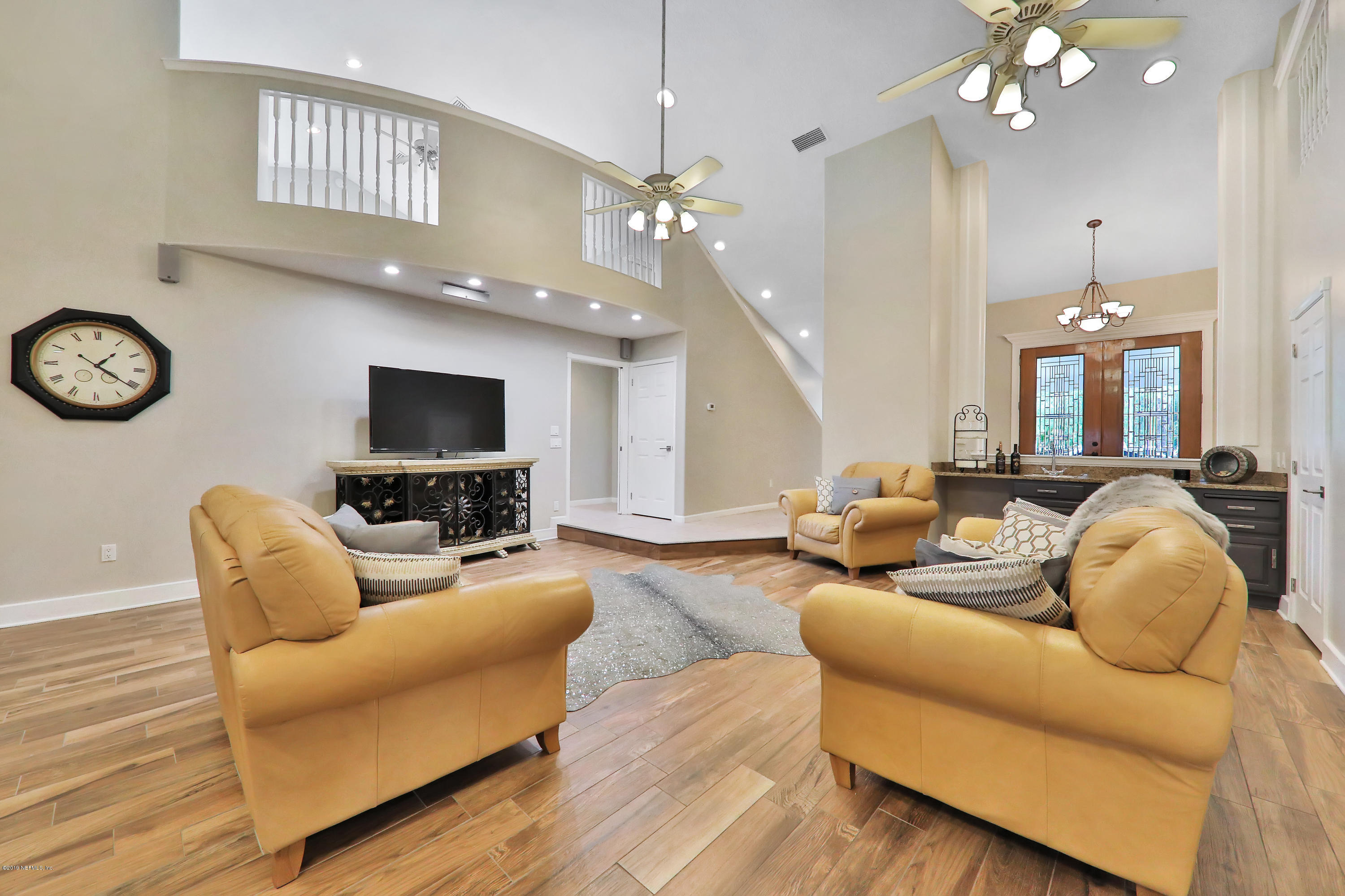 11207 Branan Field Road Jacksonville, FL 32222 - Photo 21 of 102 Great Room with Loft Above