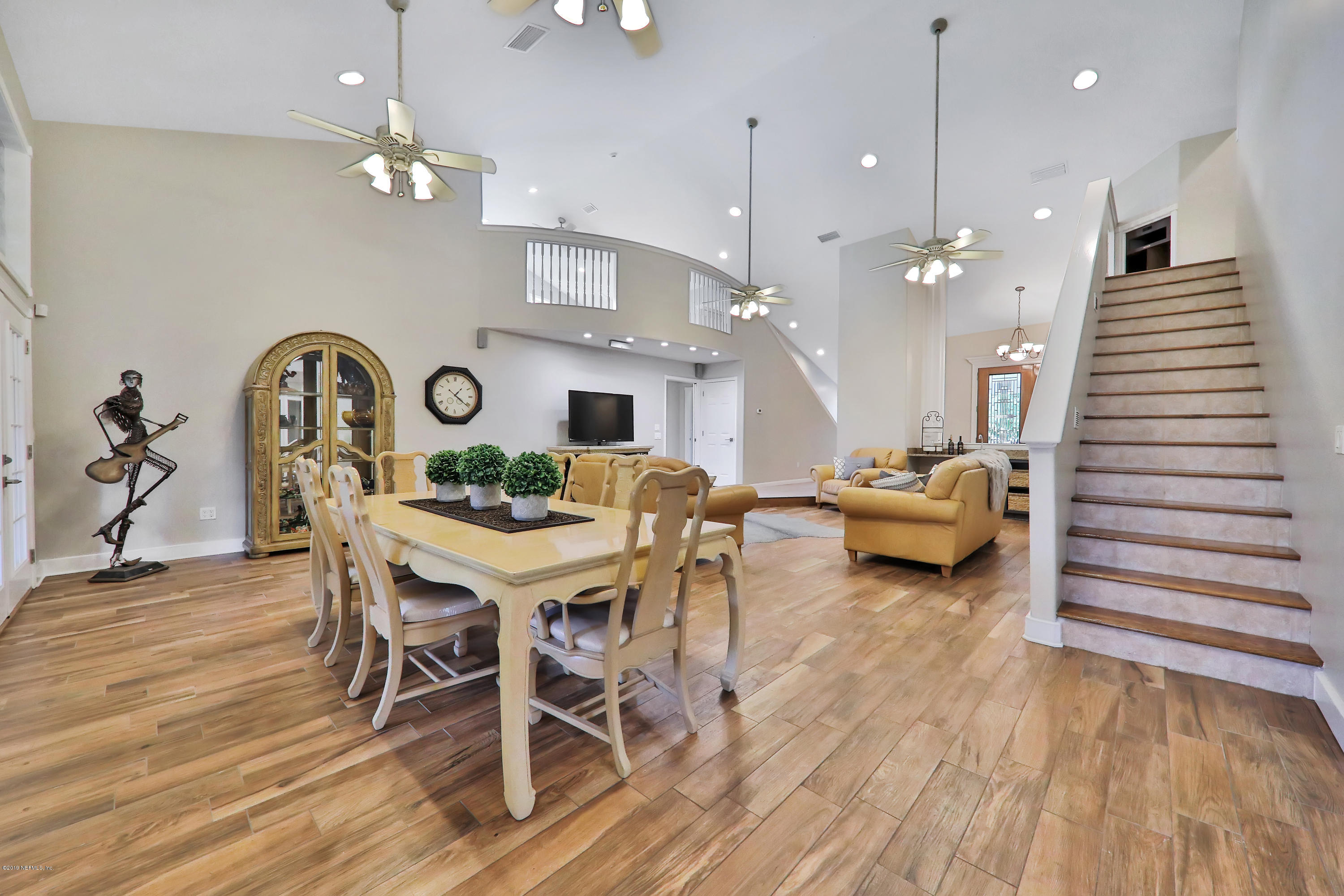 11207 Branan Field Road Jacksonville, FL 32222 - Photo 26 of 102 Dining Area and Stairs up to Media Room