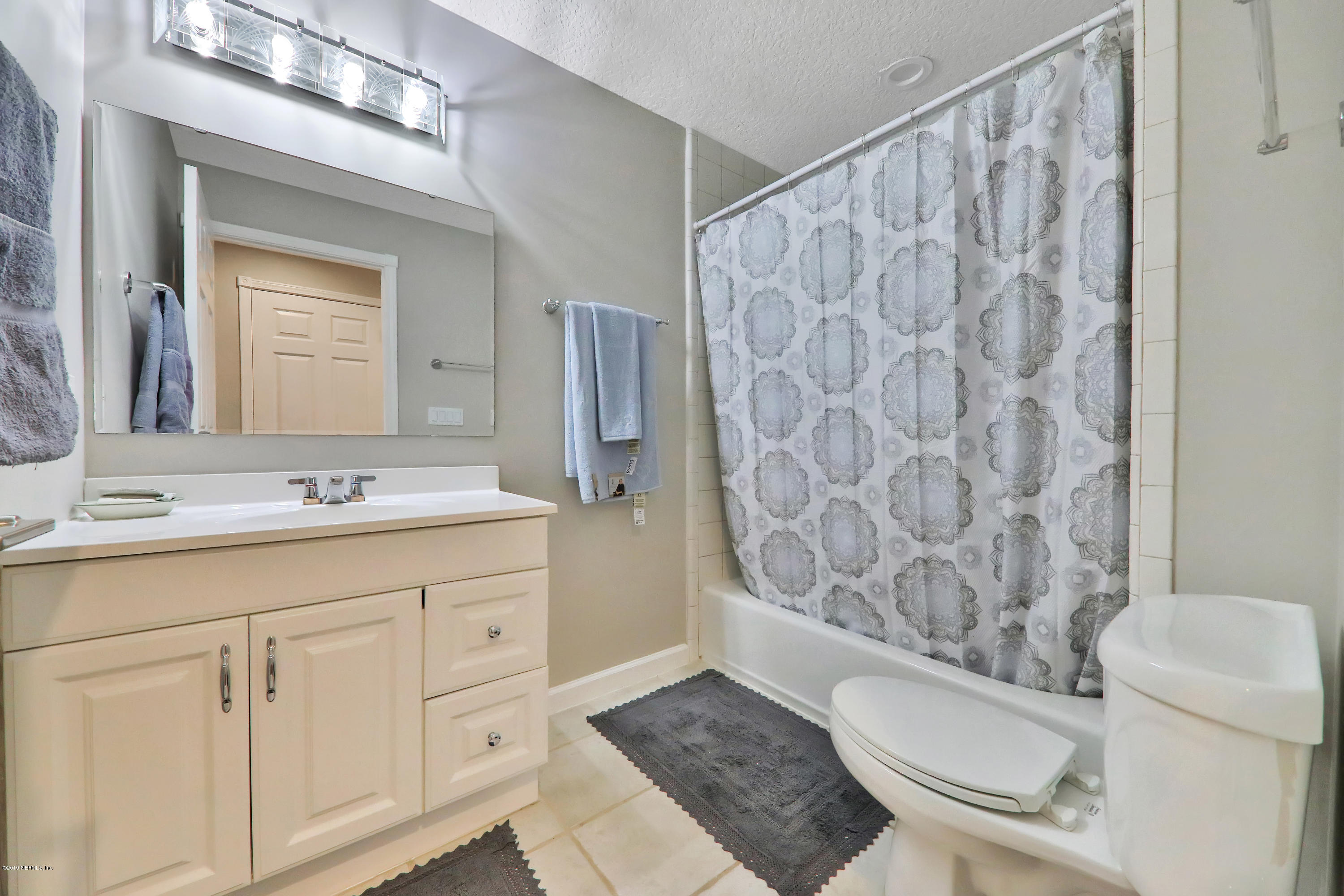 11207 Branan Field Road Jacksonville, FL 32222 - Photo 38 of 102 Upstairs Media Room Bathroom