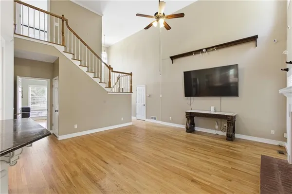 a bedroom with a bed and dresser