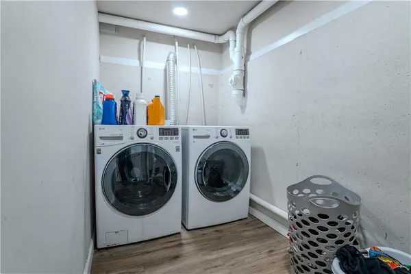 a utility room with dryer and washer