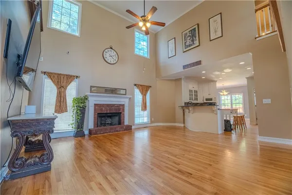 a view of a livingroom with furniture a fireplace