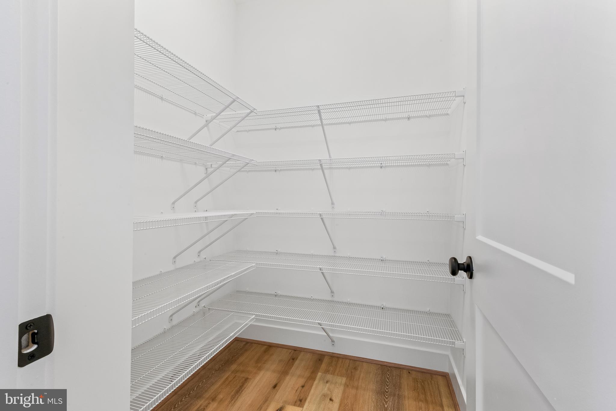 6016 Drum Point Road Deale, MD 20751 - Photo 15 of 42 a view of a room with racks on the wall