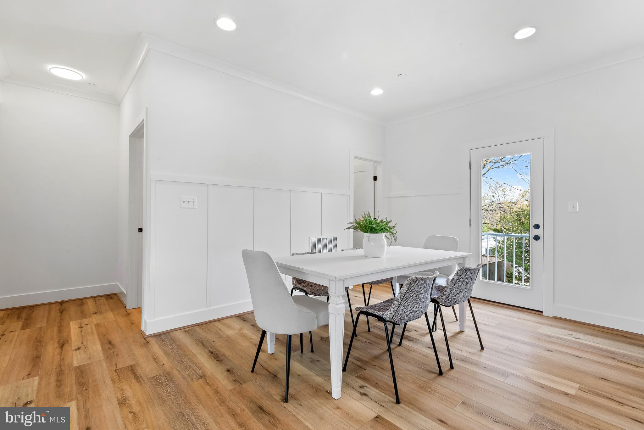 6016 Drum Point Road Deale, MD 20751 - Photo 16 of 42 a view of a dining room with furniture and wooden floor