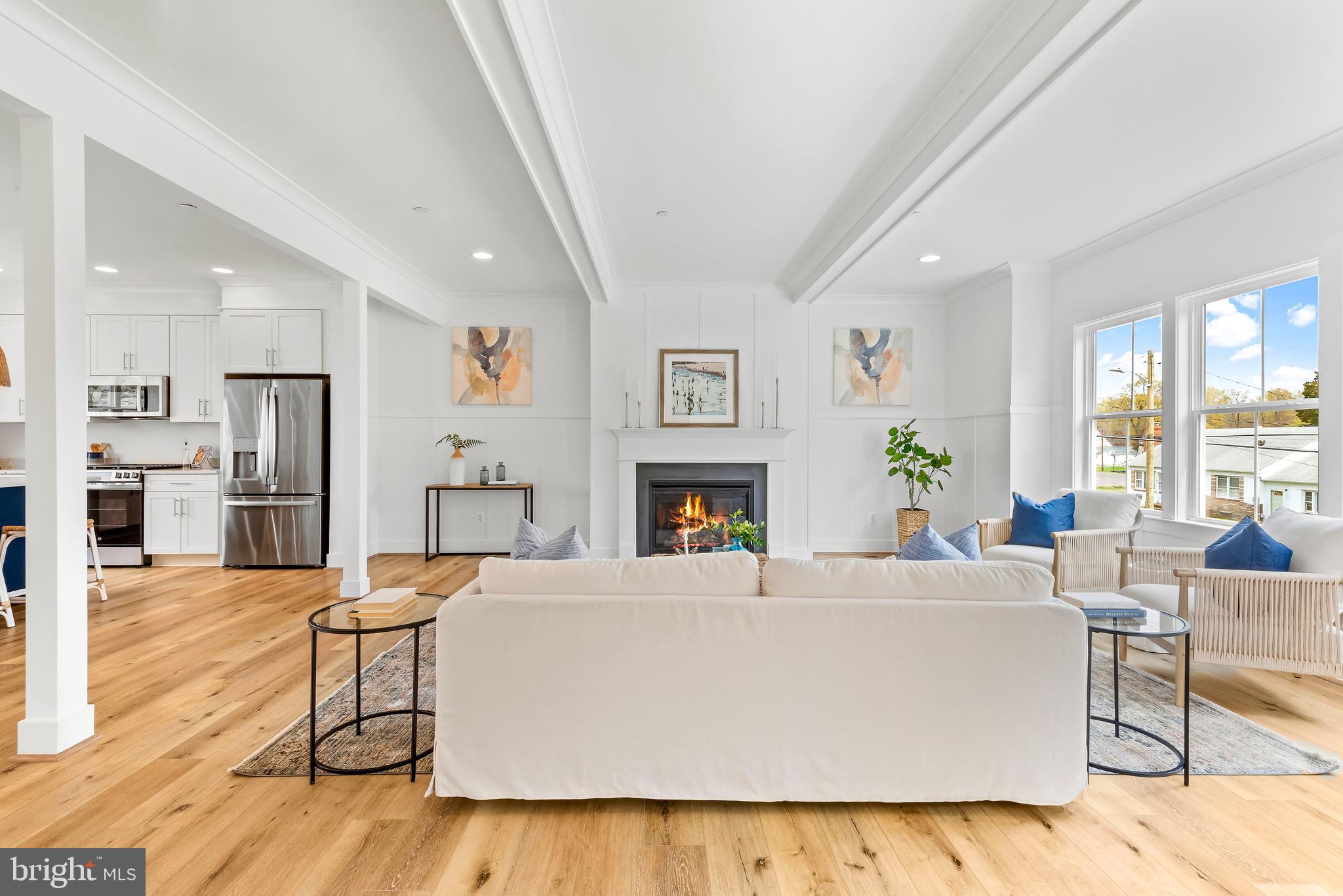 6016 Drum Point Road Deale, MD 20751 - Photo 21 of 42 a living room with furniture and a fireplace