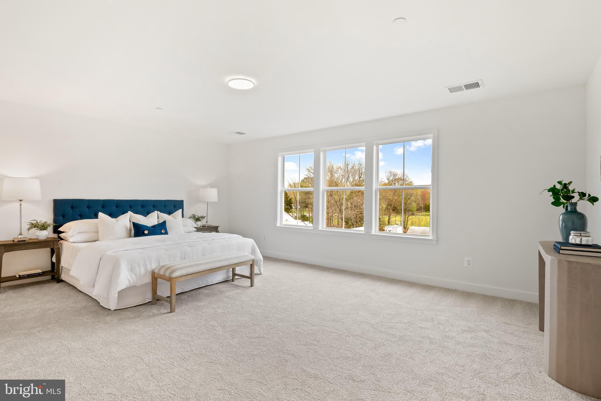 6016 Drum Point Road Deale, MD 20751 - Photo 25 of 42 a bed sitting in a spacious bedroom next to a window