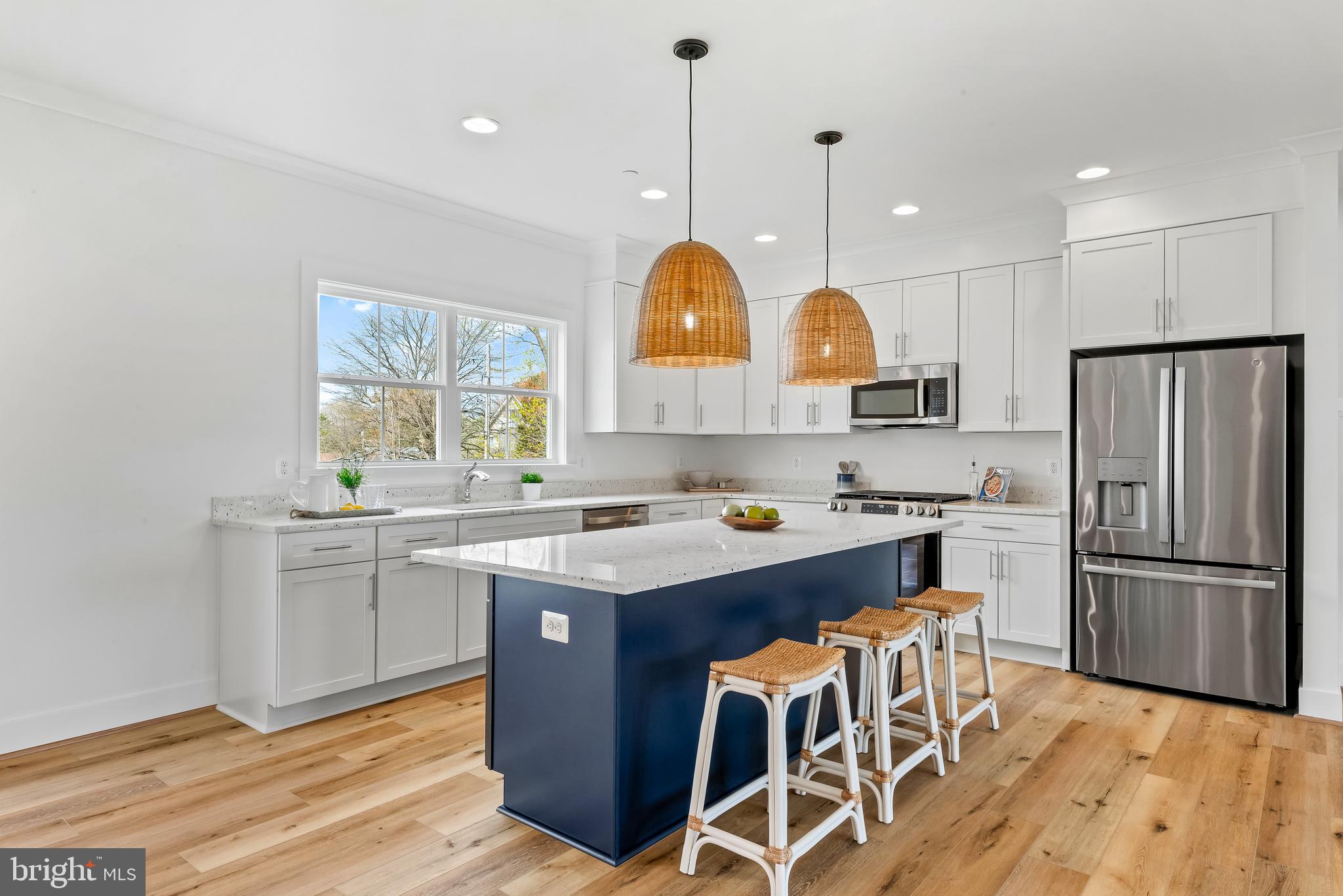6016 Drum Point Road Deale, MD 20751 - Photo 7 of 42 a kitchen with granite countertop a sink appliances a counter space and a window