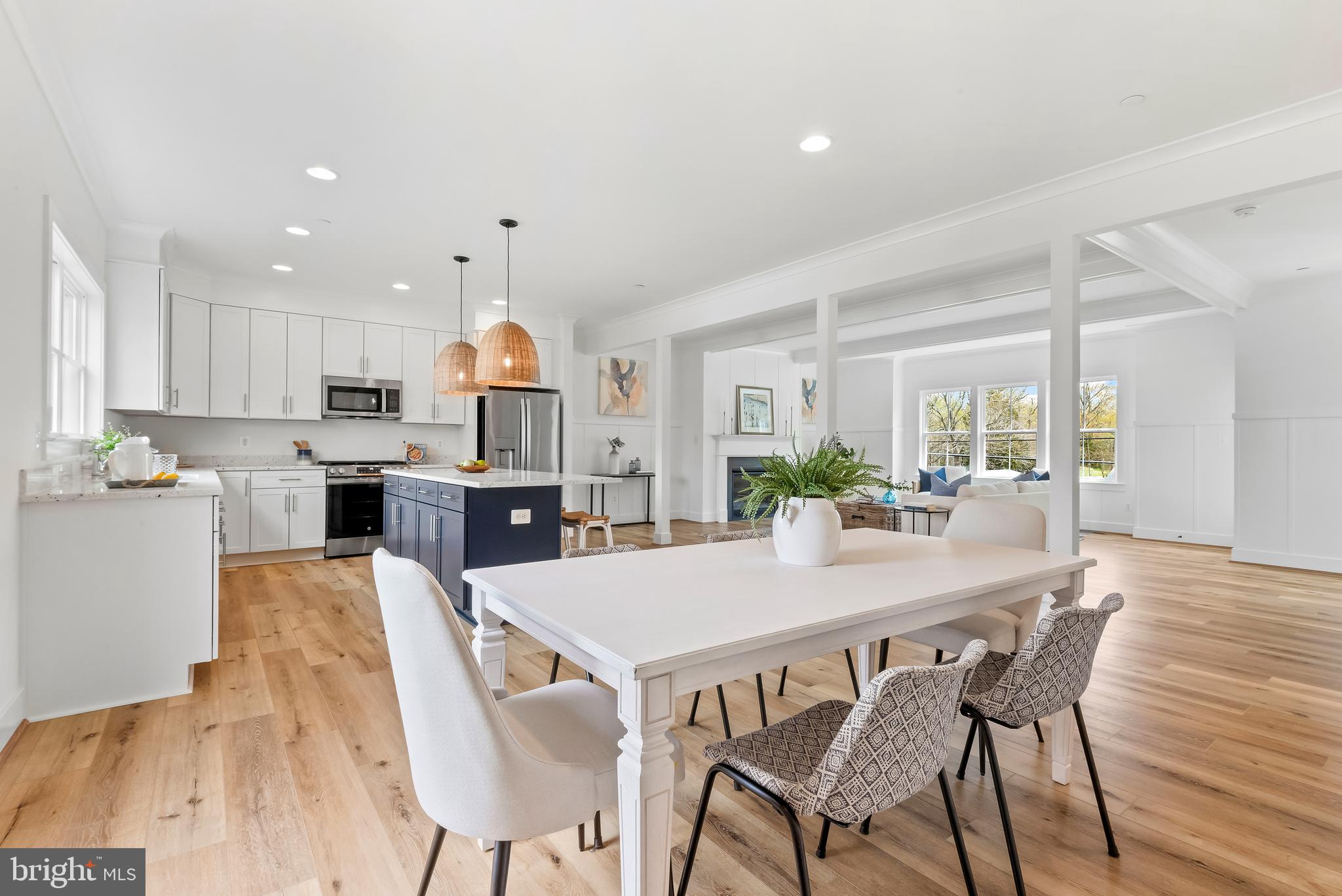 6016 Drum Point Road Deale, MD 20751 - Photo 9 of 42 a view of a dining room with furniture window and wooden floor