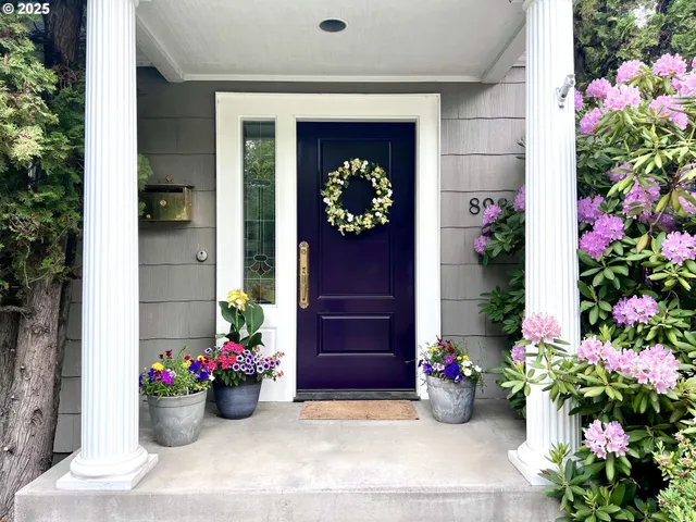 a view of a entryway with flower pots
