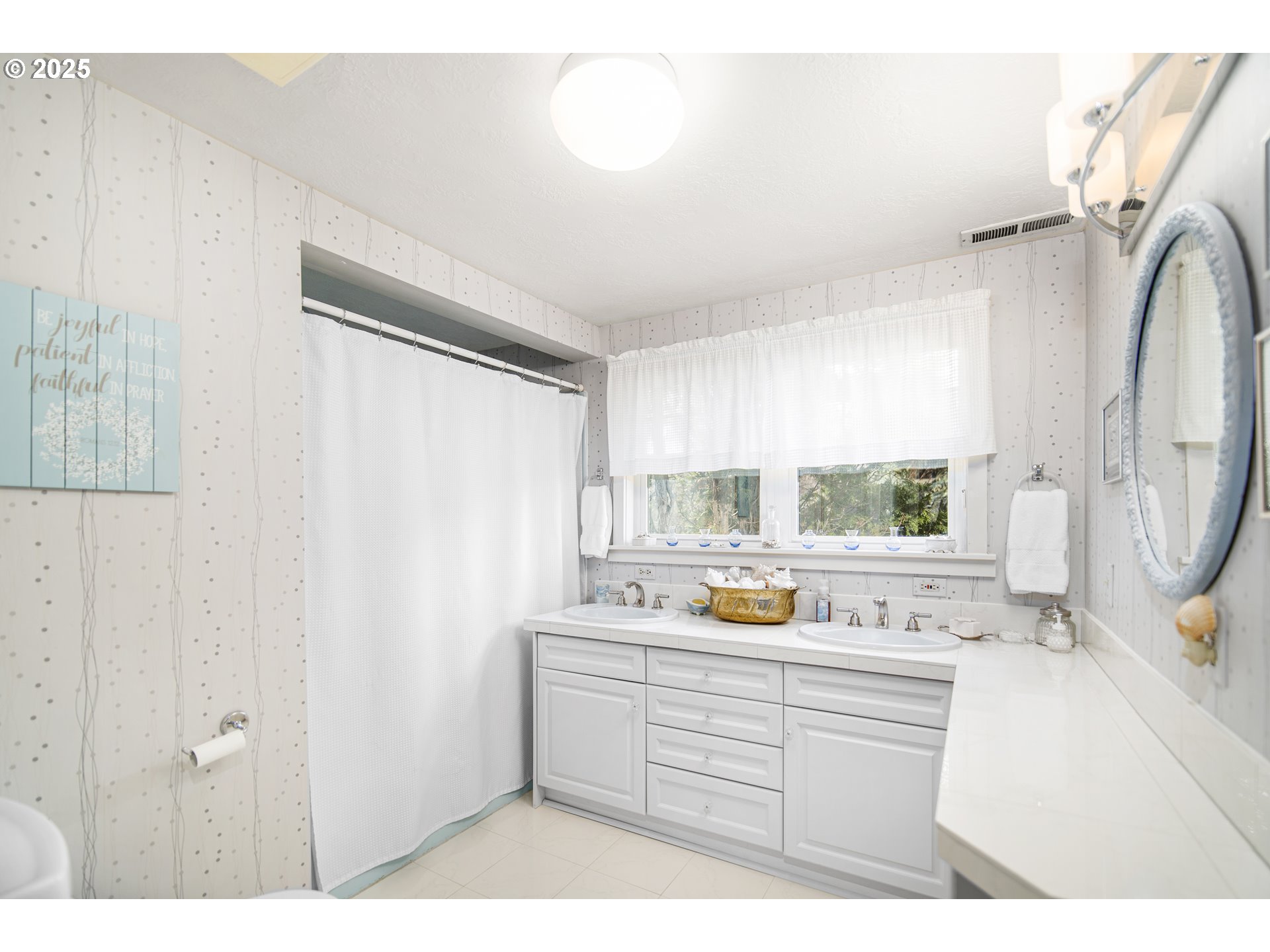 898 Northwest Riverside Boulevard Bend, OR 97703 - Photo 21 of 32 a kitchen with a refrigerator sink and cabinets