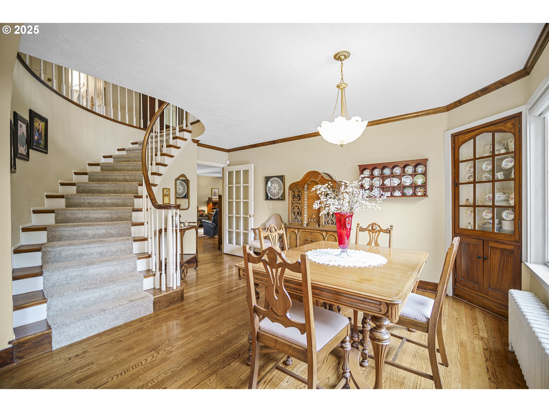 898 Northwest Riverside Boulevard Bend, OR 97703 - Photo 5 of 32 a view of a dining room with furniture window and wooden floor
