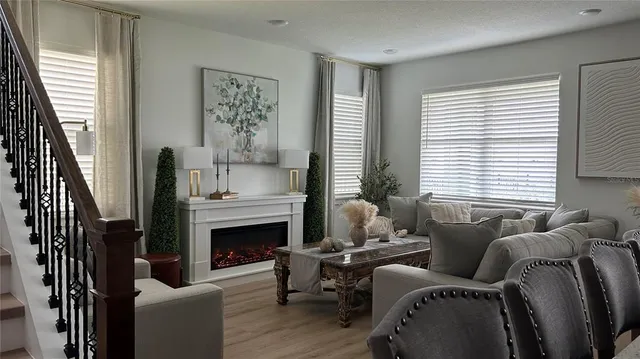 a living room with furniture and a window