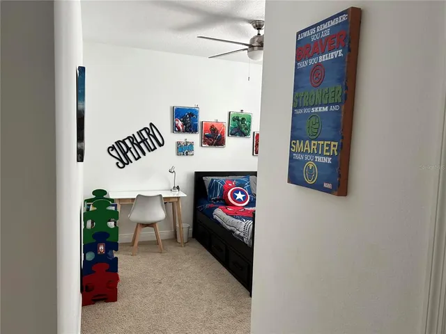 a bathroom with a sink vanity and a mirror