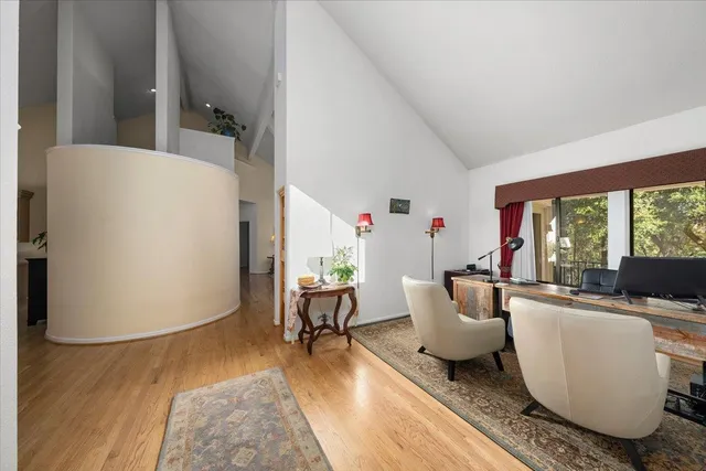 a view of a living room and kitchen