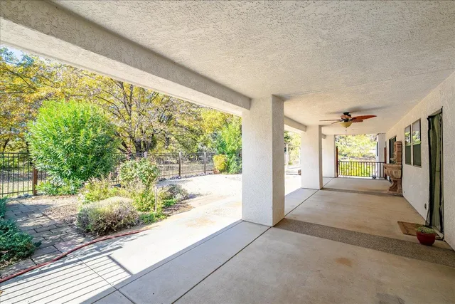 a view of a livingroom with furniture and a garage