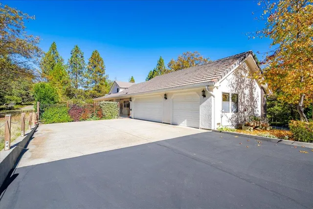 a view of balcony with wooden floor and seating space