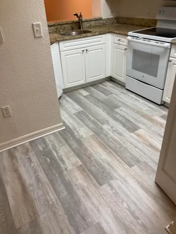 a bathroom with a sink and vanity