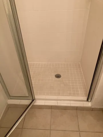 a kitchen with a stove and a refrigerator