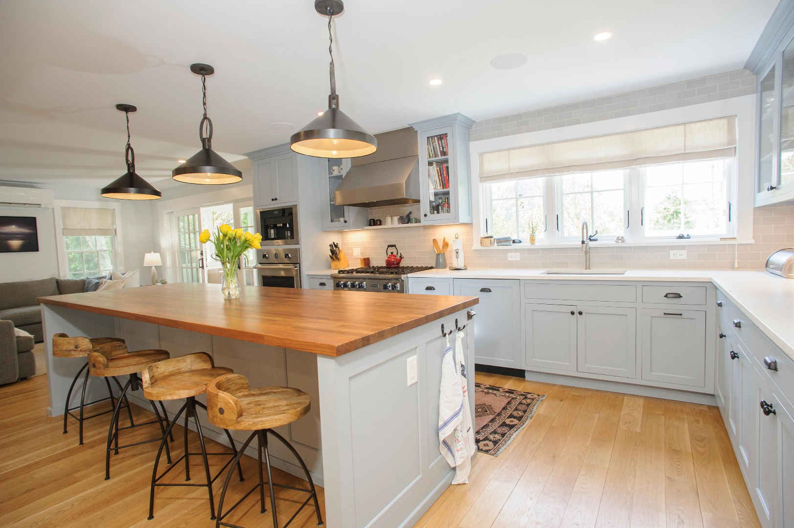 31 North Street Edgartown, MA 02539 - Photo 19 of 49 a kitchen with stainless steel appliances granite countertop a sink a stove and a wooden floors
