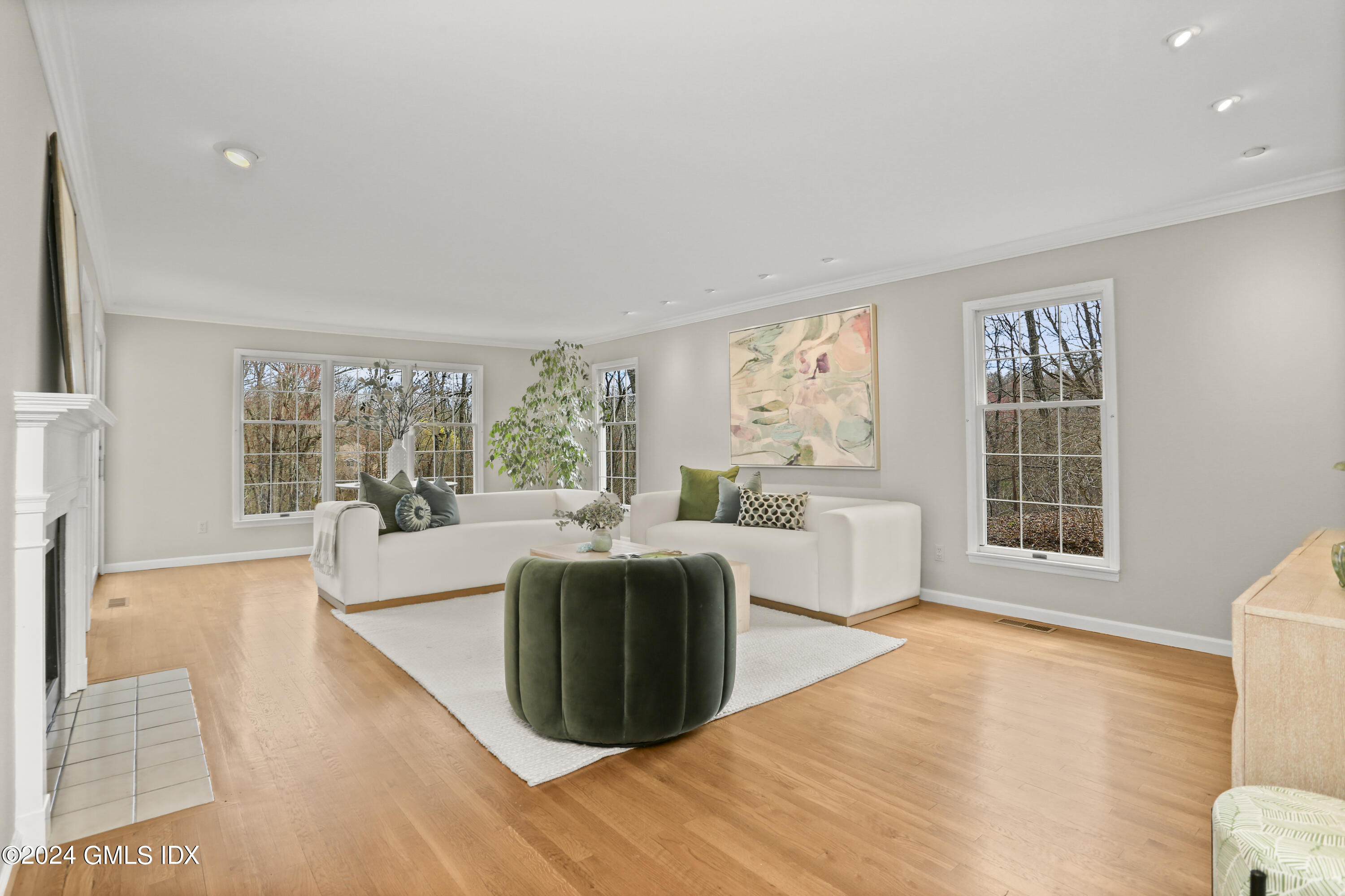 677 Westover Road Stamford, CT 06902 - Photo 7 of 42 a living room with furniture and a large window