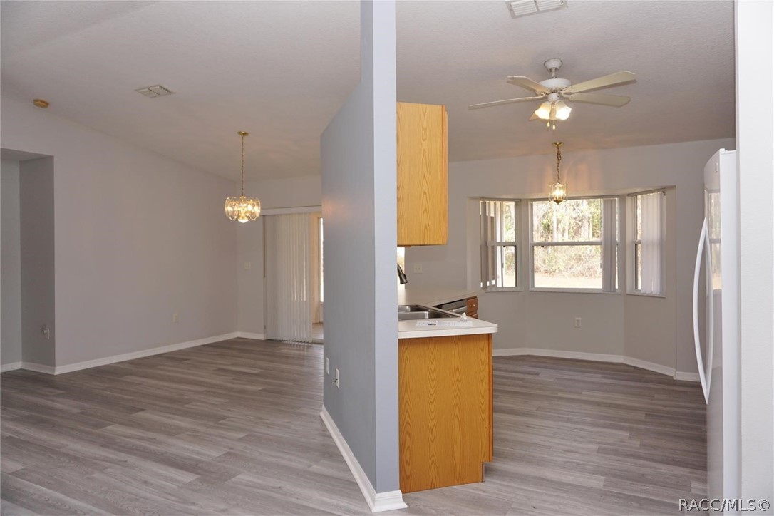 6079 East Penrose Street Inverness, FL 34452 - Photo 7 of 59 Living Room to Kitchen