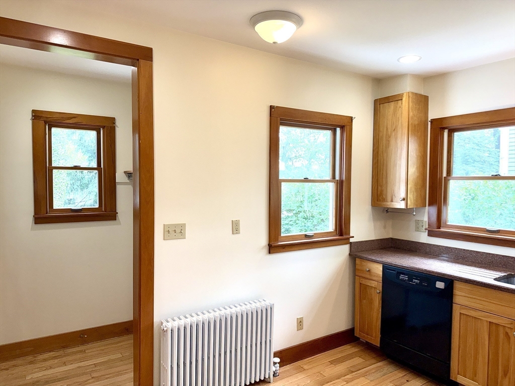 39 Newman Road Malden, MA 02148 - Photo 10 of 27 a view of a kitchen and an empty room