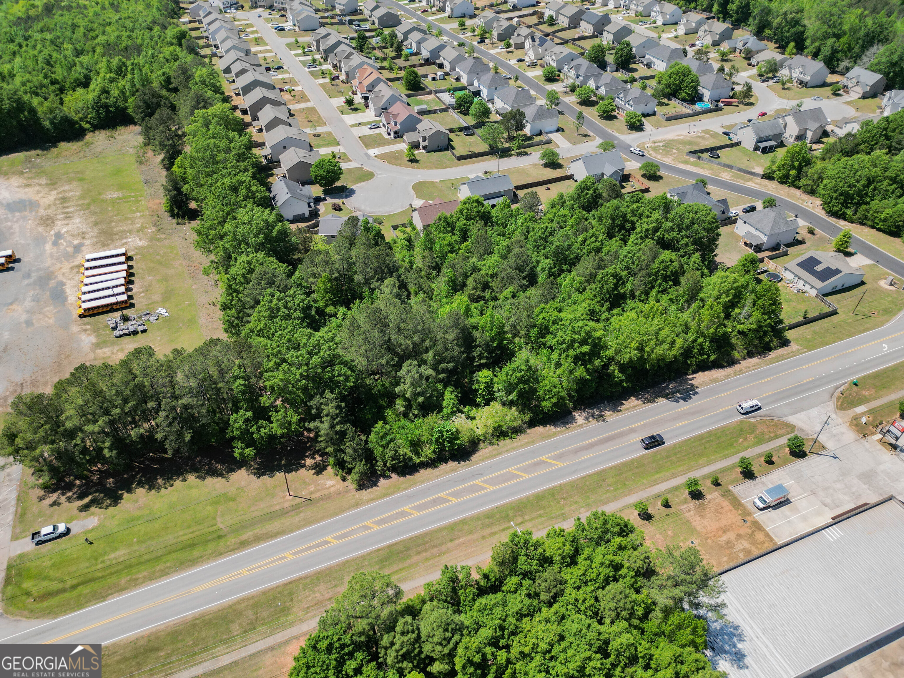 0 Macon Road Perry, GA 31069 - Photo 12 of 19 an aerial view of a house with a yard and garden in the back