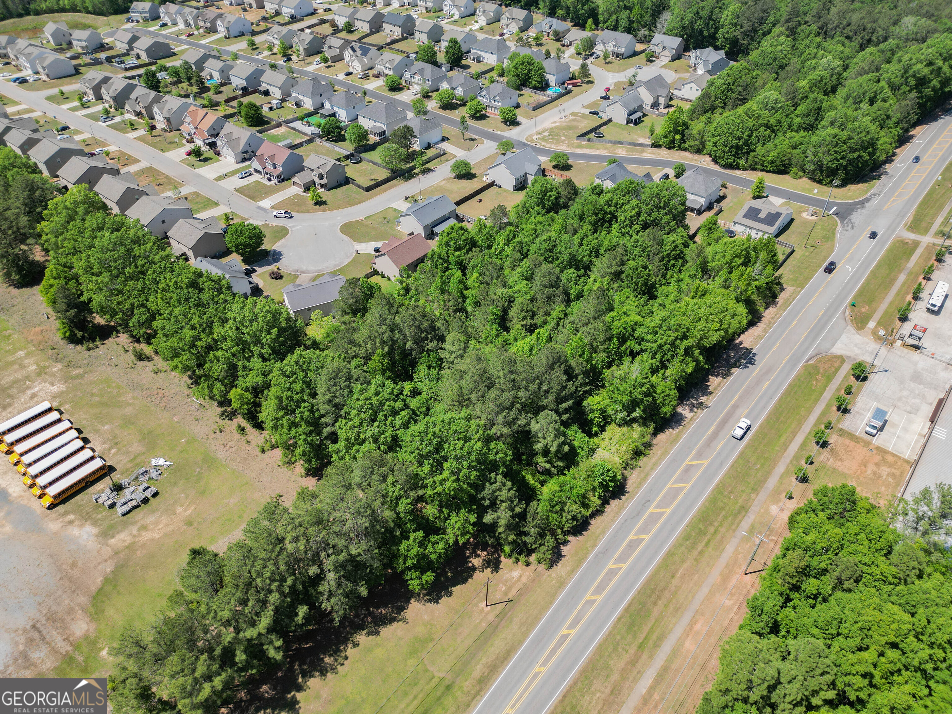 0 Macon Road Perry, GA 31069 - Photo 14 of 19 an aerial view of a house with a yard and garden in the back