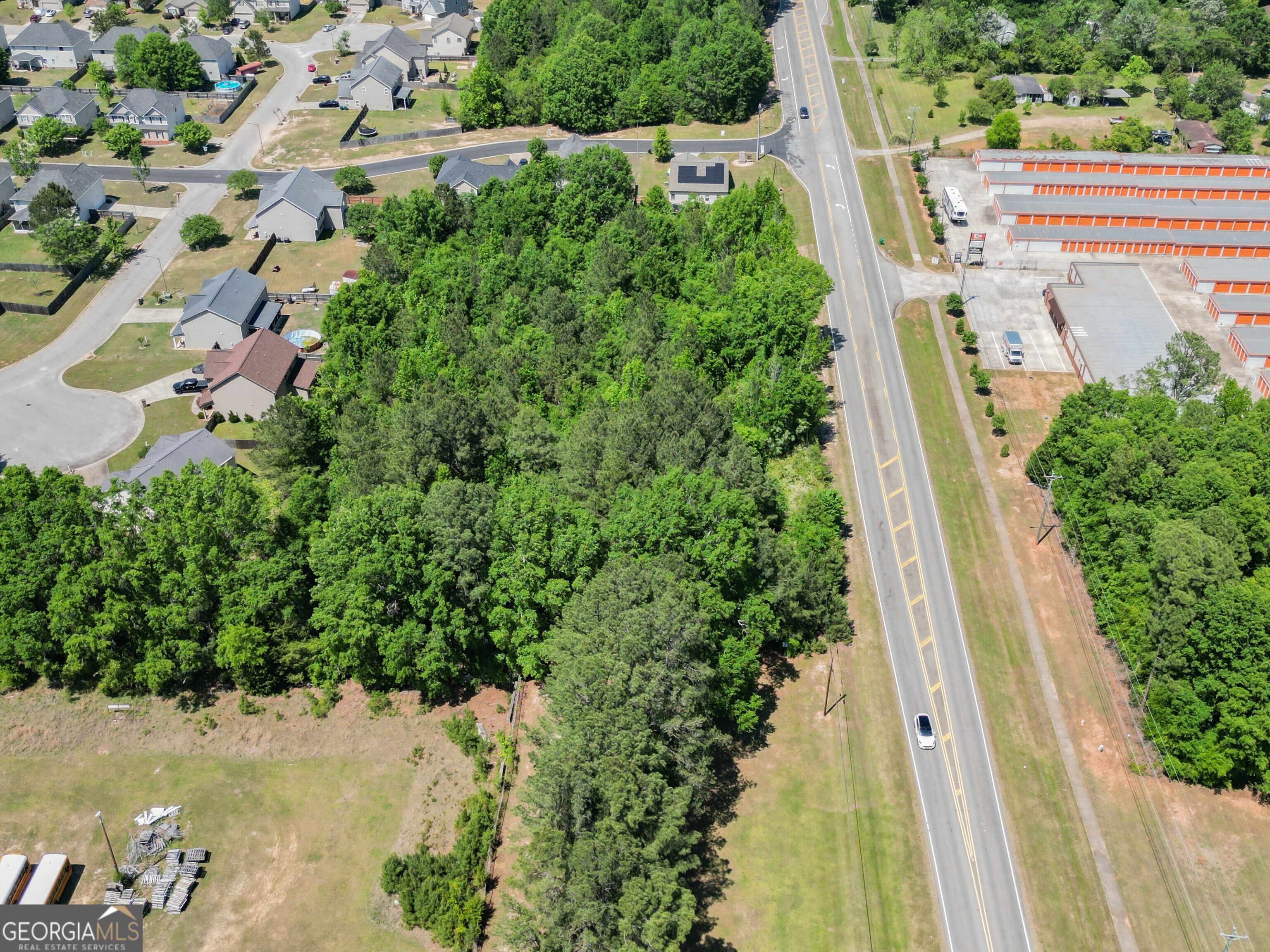 0 Macon Road Perry, GA 31069 - Photo 19 of 19 a view of a yard with plants and large trees
