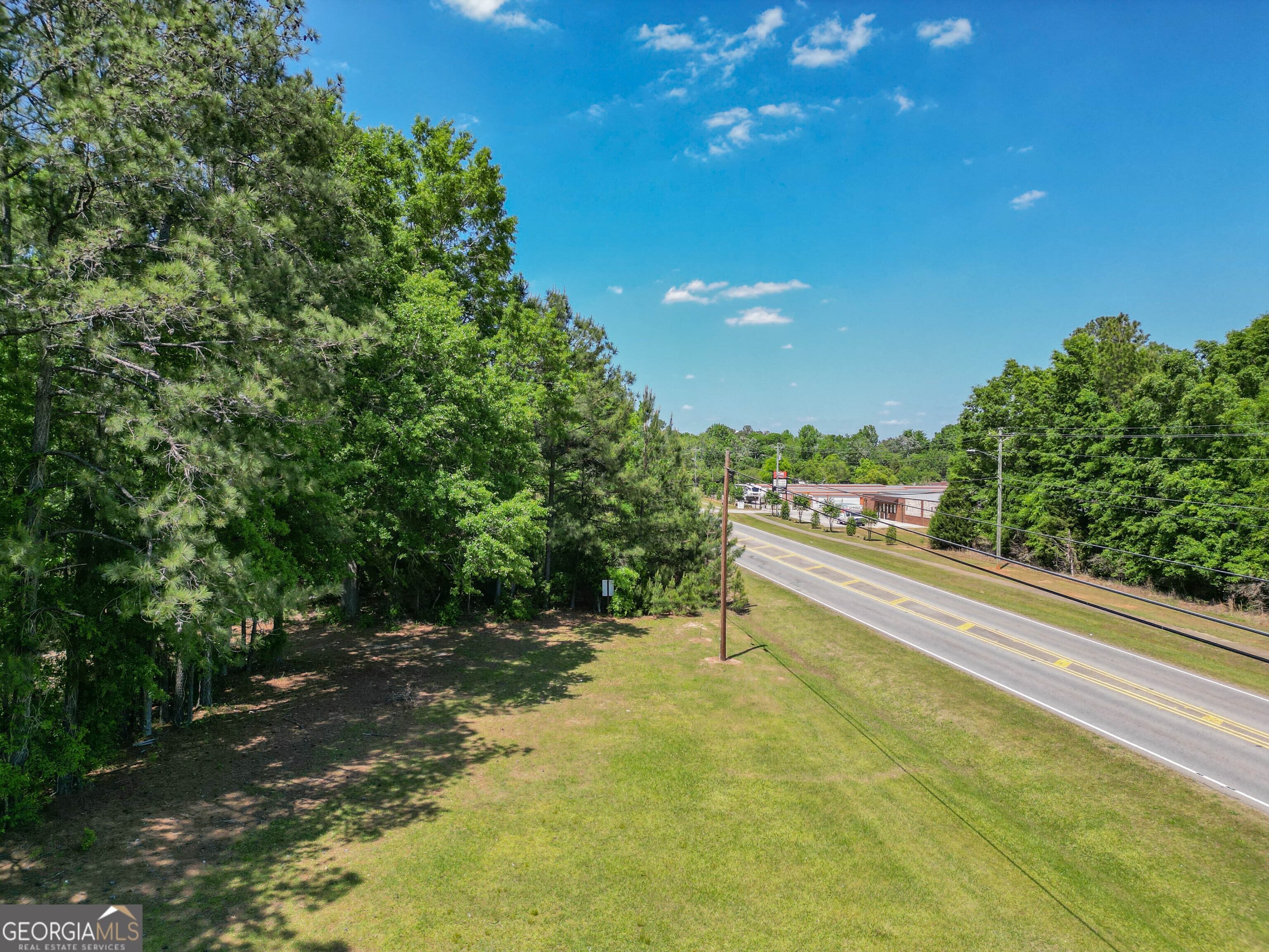 0 Macon Road Perry, GA 31069 - Photo 2 of 19 a view of a yard with an outdoor space