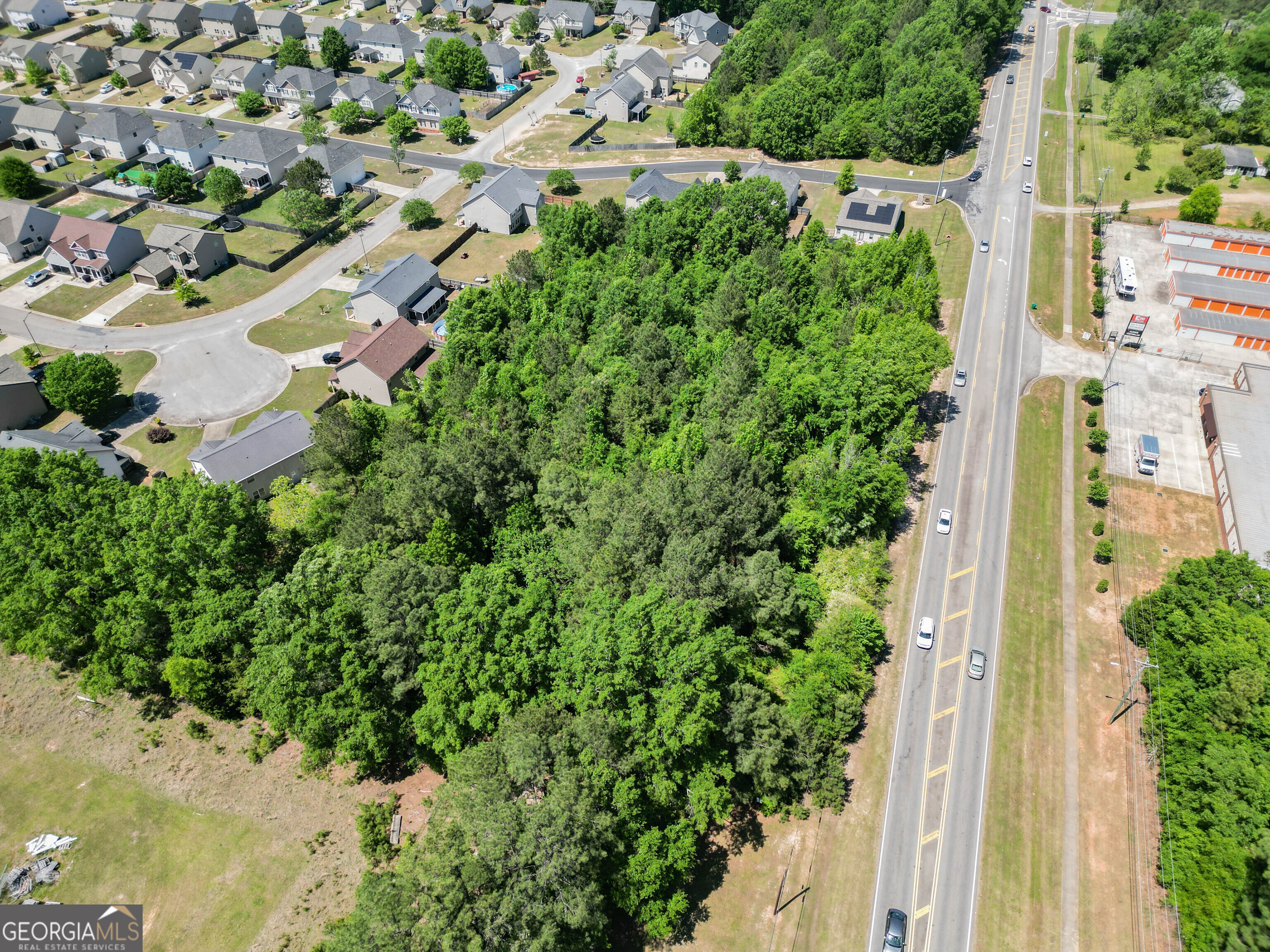 0 Macon Road Perry, GA 31069 - Photo 4 of 19 an aerial view of residential house with outdoor space and trees all around