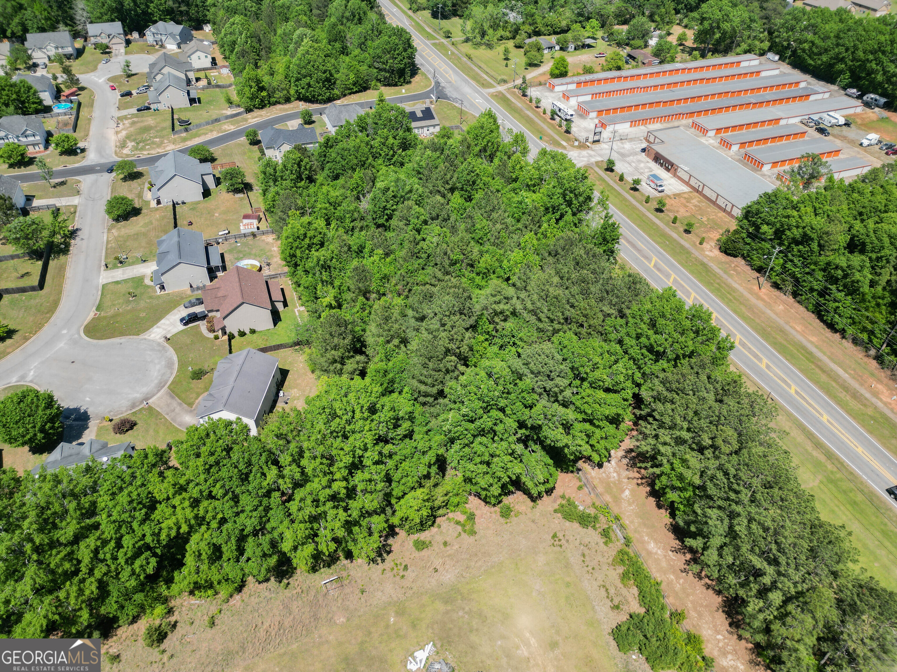 0 Macon Road Perry, GA 31069 - Photo 6 of 19 an aerial view of a house with a yard and greenery