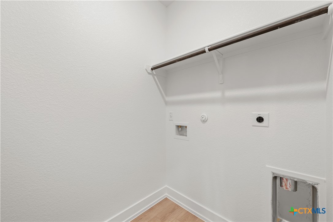 1218 Cilantro Road Temple, TX 76501 - Photo 16 of 16 a view of an empty walk in closet