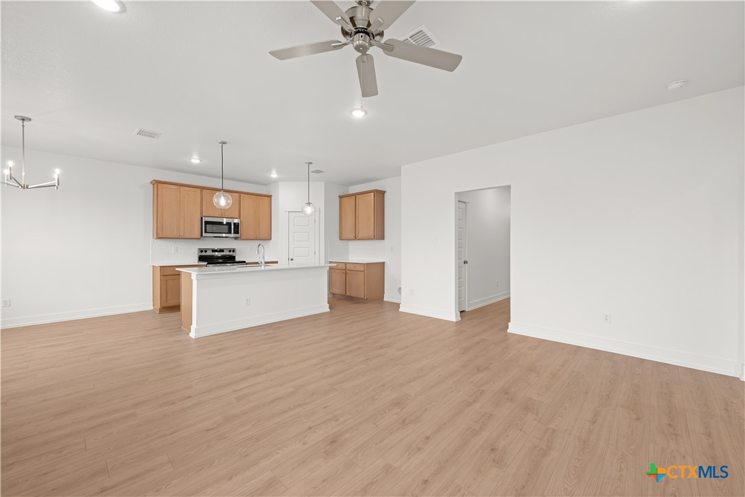 1218 Cilantro Road Temple, TX 76501 - Photo 5 of 16 a view of kitchen with microwave and cabinets