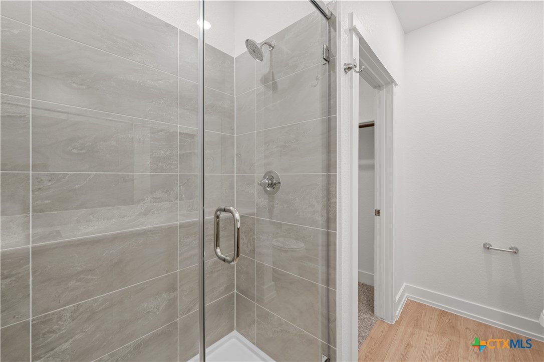1218 Cilantro Road Temple, TX 76501 - Photo 10 of 16 a bathroom with a shower