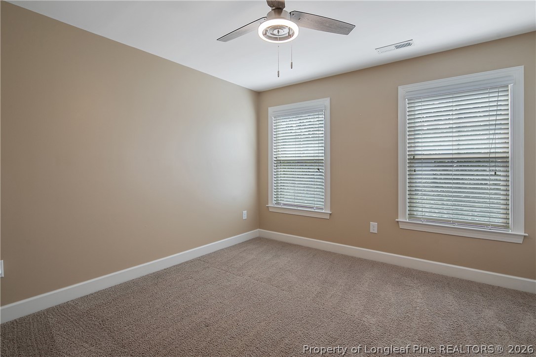 16 Spring Pond Lane Spring Lake, NC 28390 - Photo 17 of 33 an empty room with windows