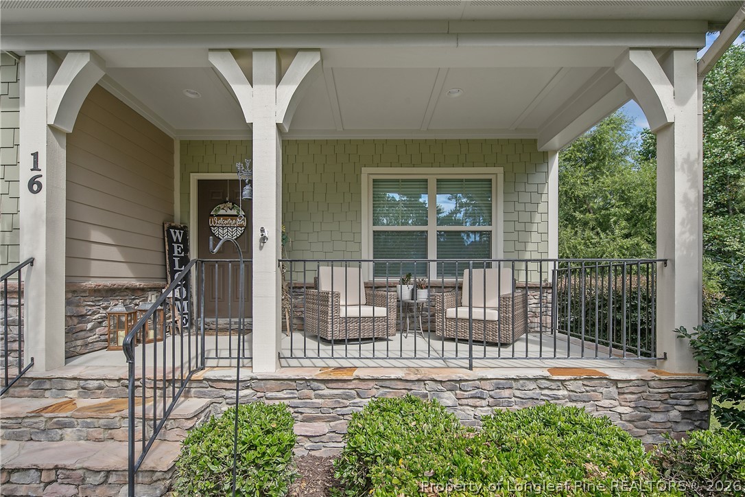 16 Spring Pond Lane Spring Lake, NC 28390 - Photo 2 of 33 a house view with a outdoor space