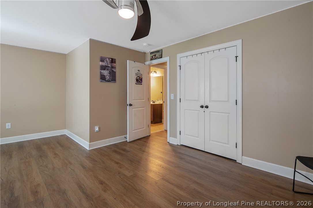 16 Spring Pond Lane Spring Lake, NC 28390 - Photo 22 of 33 wooden floor in an empty room