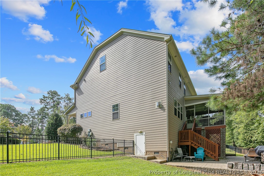 16 Spring Pond Lane Spring Lake, NC 28390 - Photo 31 of 33 a front view of a house with a garden