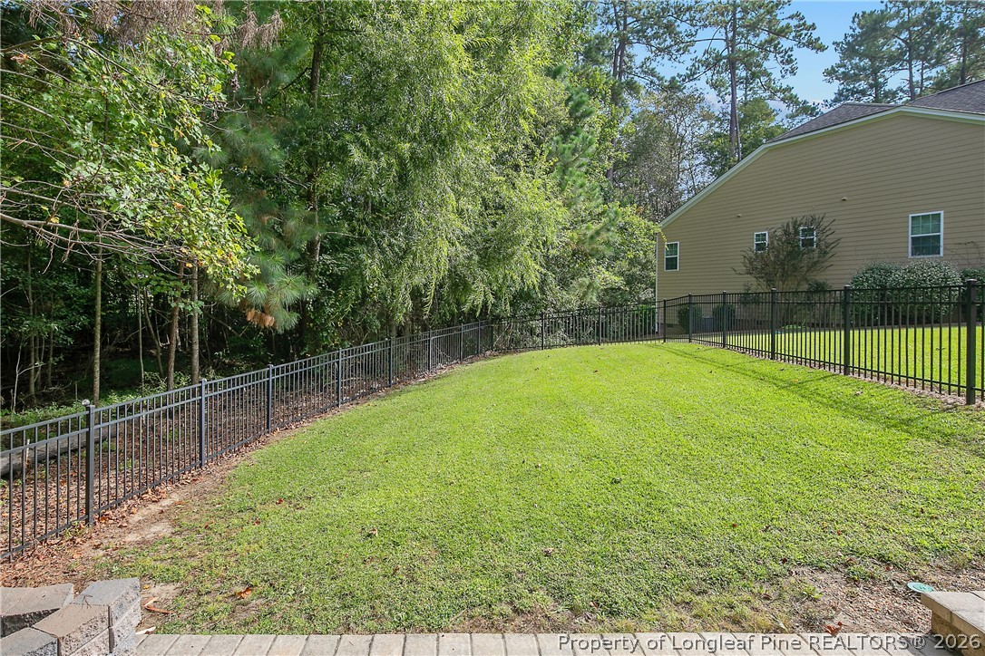 16 Spring Pond Lane Spring Lake, NC 28390 - Photo 32 of 33 a view of a backyard