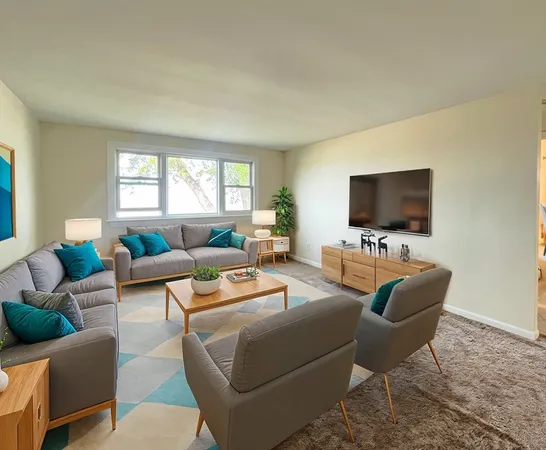 a bedroom with bed plant and window