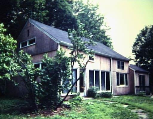 91 Toddy Hill Road Newtown, CT 06482 - Photo 1 of 1 a front view of house with yard and green space