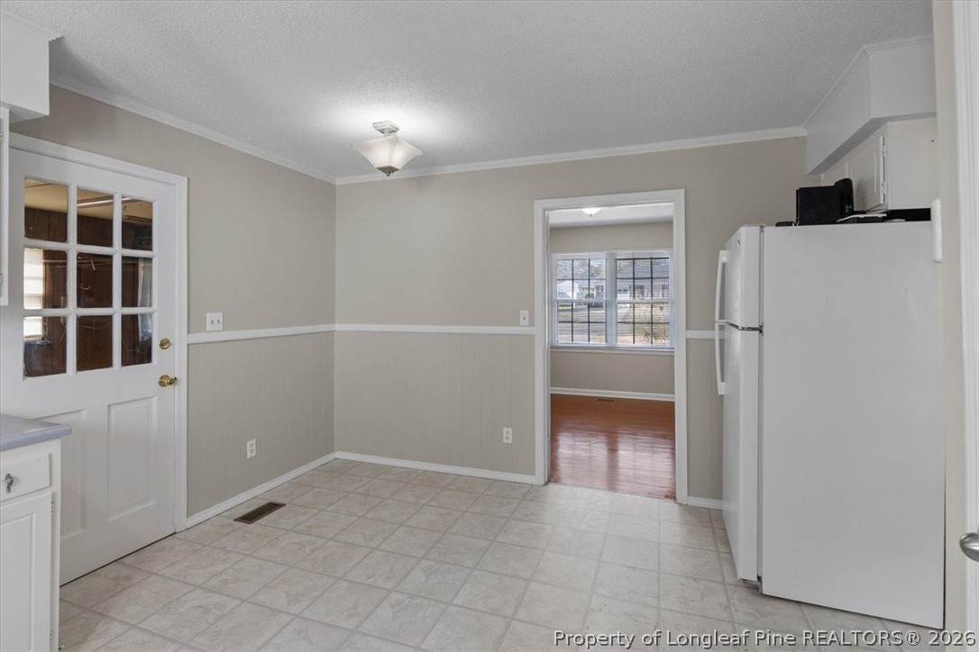 630 Bedford Road Fayetteville, NC 28303 - Photo 9 of 21 a view of a closet area with living room