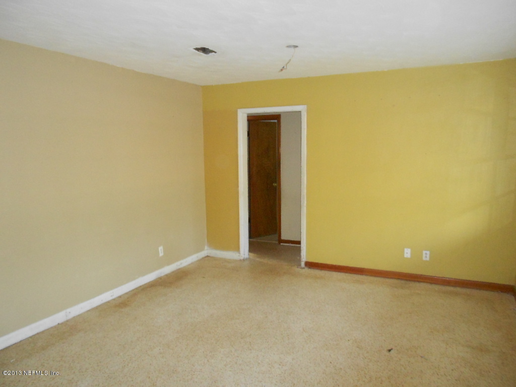 3765 Bess Road Jacksonville, FL 32277 - Photo 4 of 8 a view of an empty room